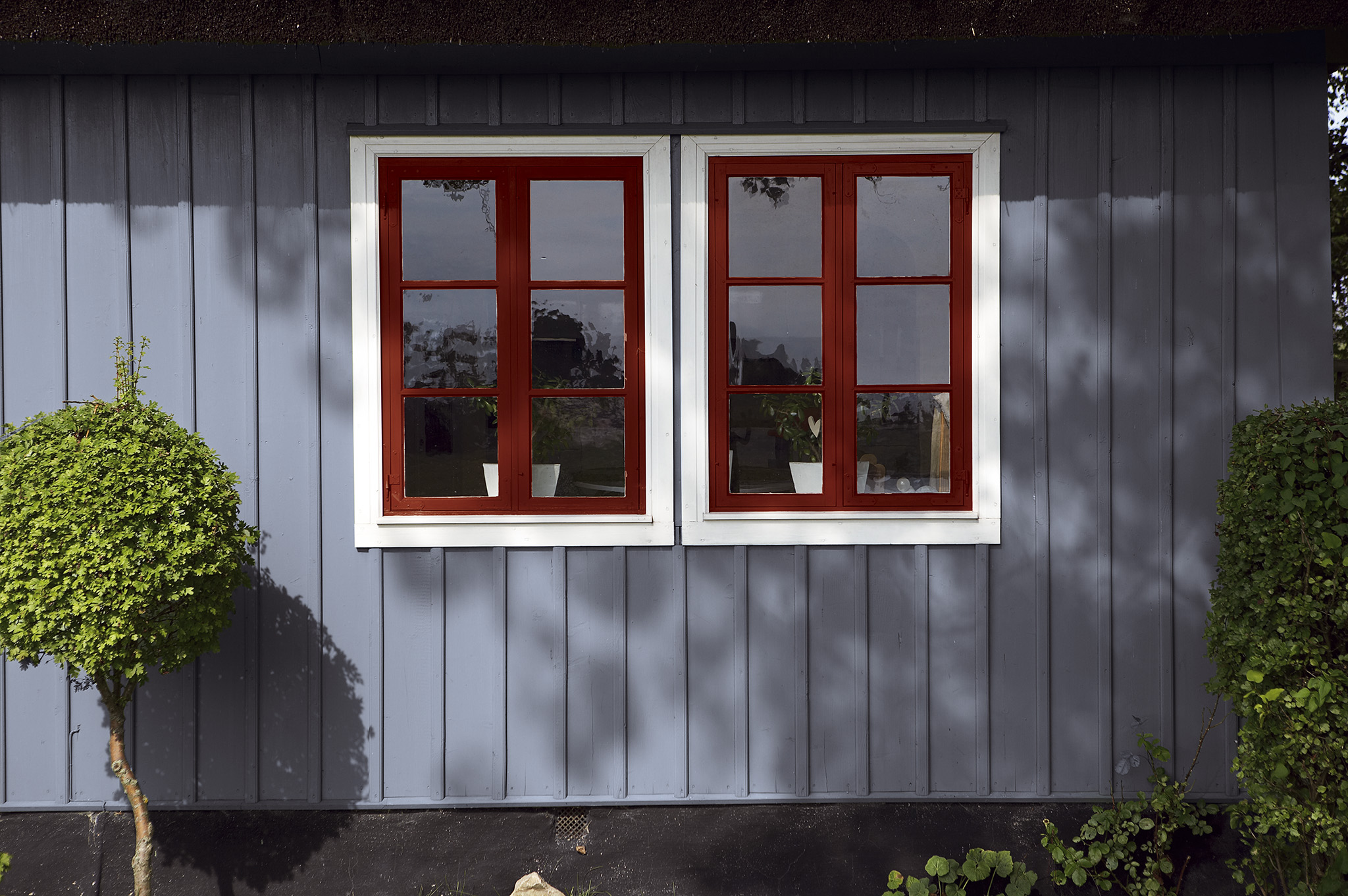 Mal blå husfacade Mal blå husfacade